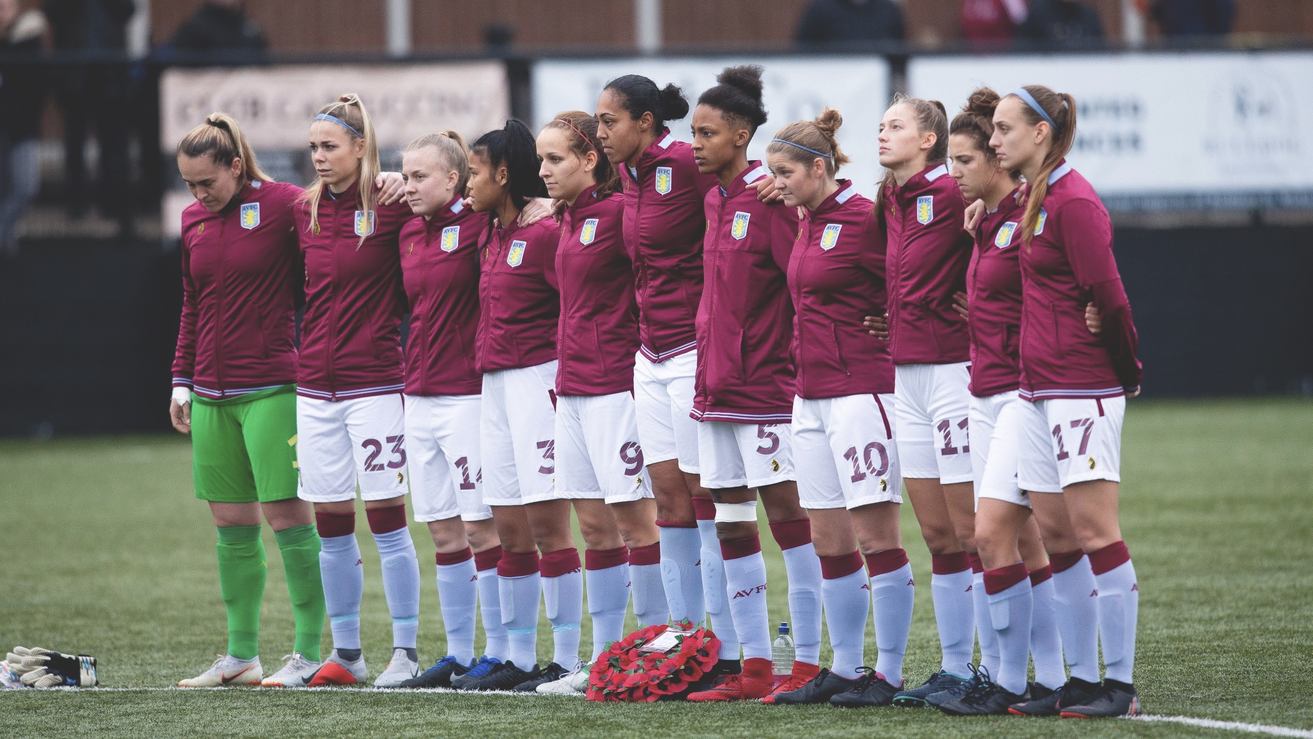 Aston Villa Ladies during the minutes silence in honour of remembrance day.