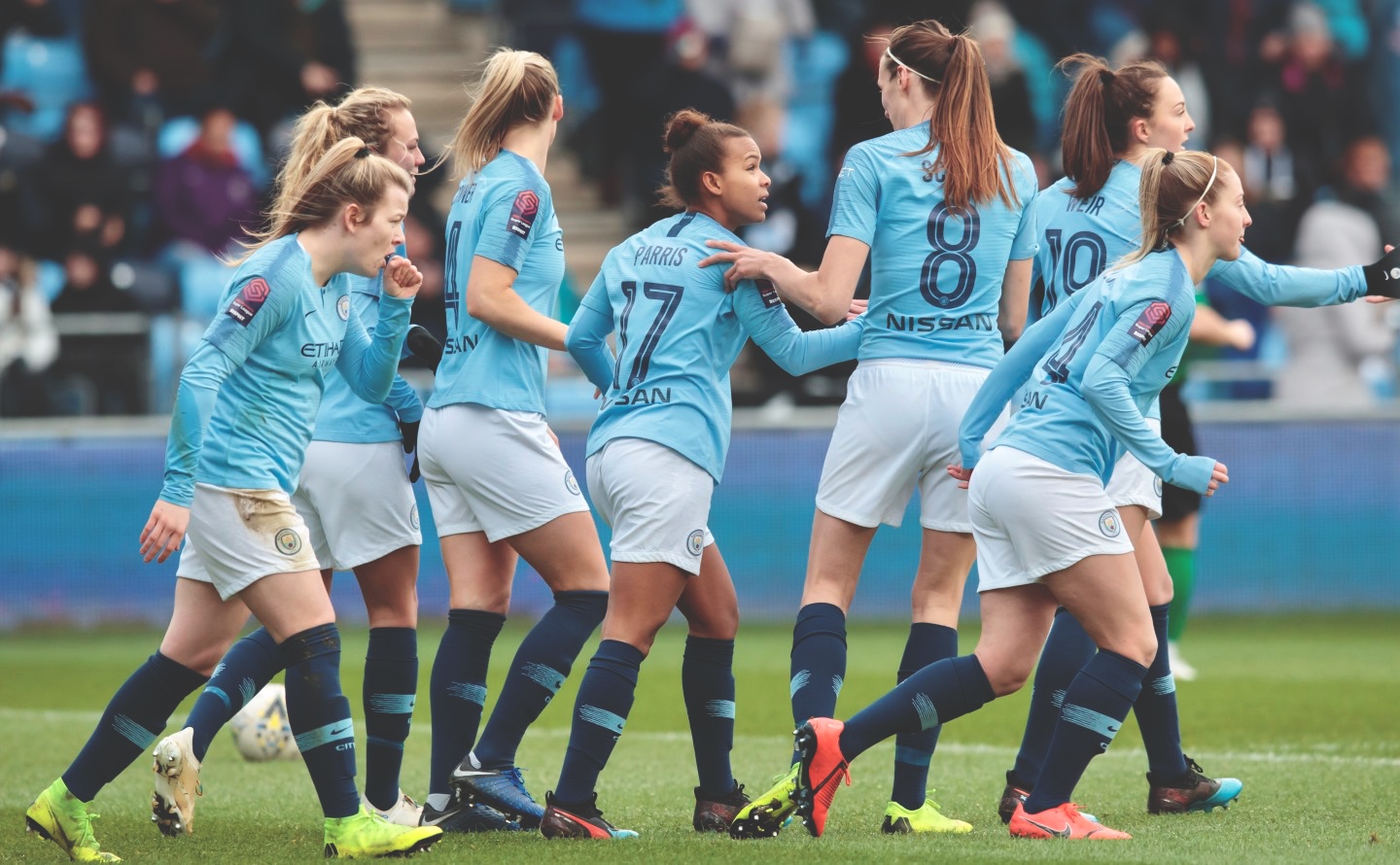 Nikita Parris of Manchester City Women centre celebrates with teammates after scoring