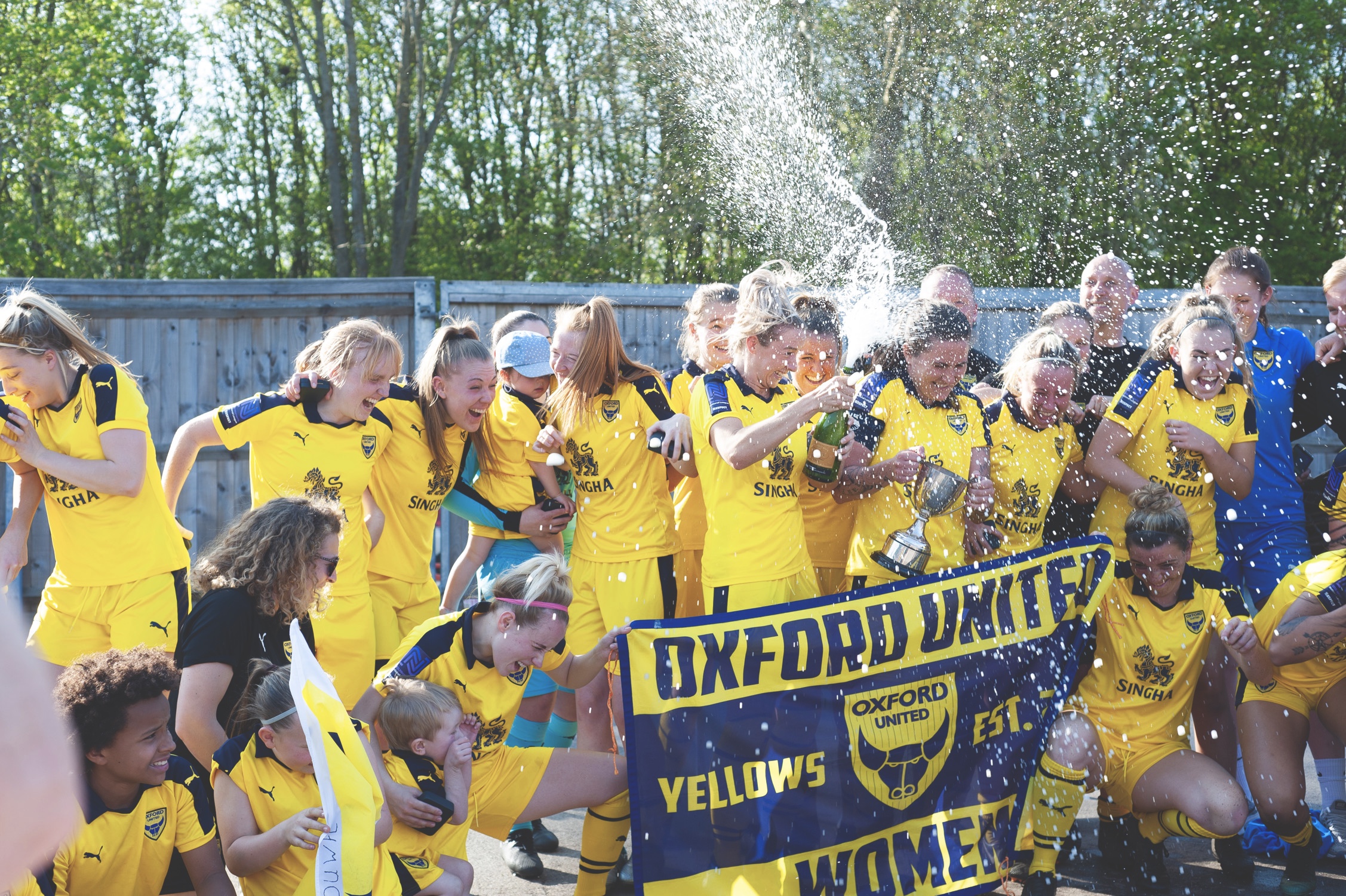 Oxford United celebrate after a local cup win. Photo by @TimAngerPhoto